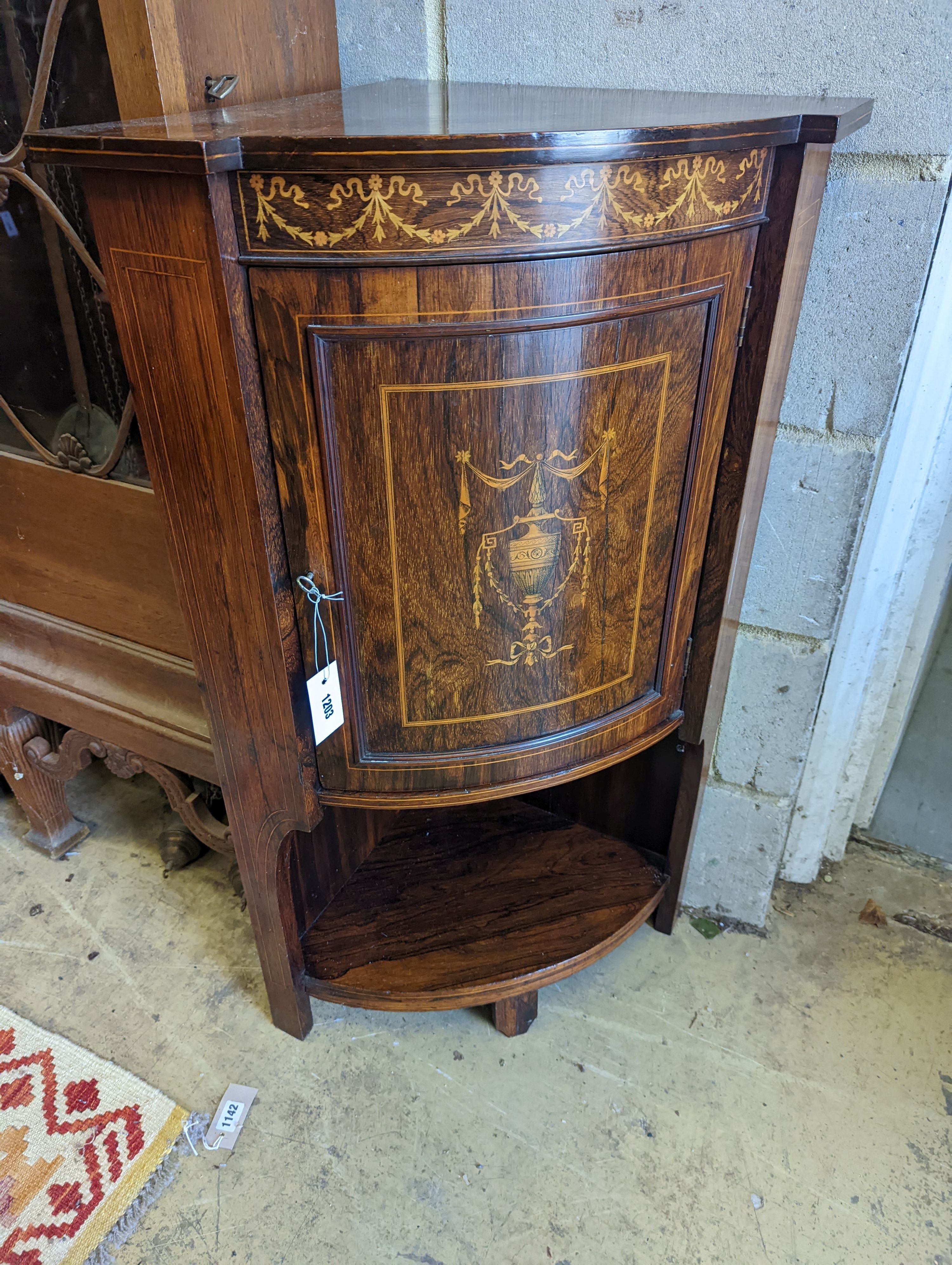 An Edwardian marquetry inlaid rosewood bowfront corner cupboard, width 61cm, depth 43cm, height 97cm